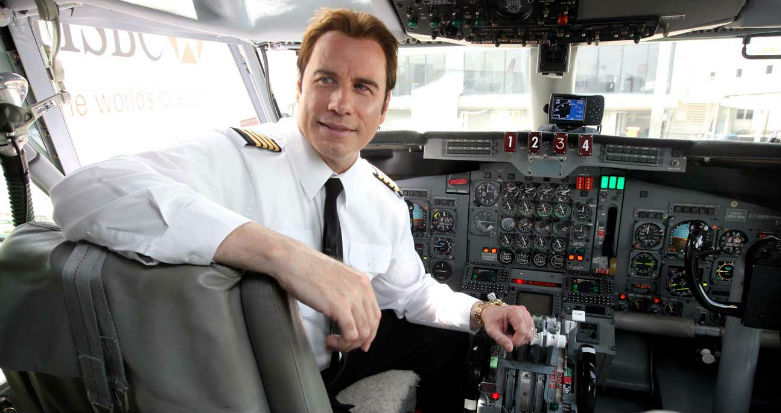 John Travolta in a cockpit.