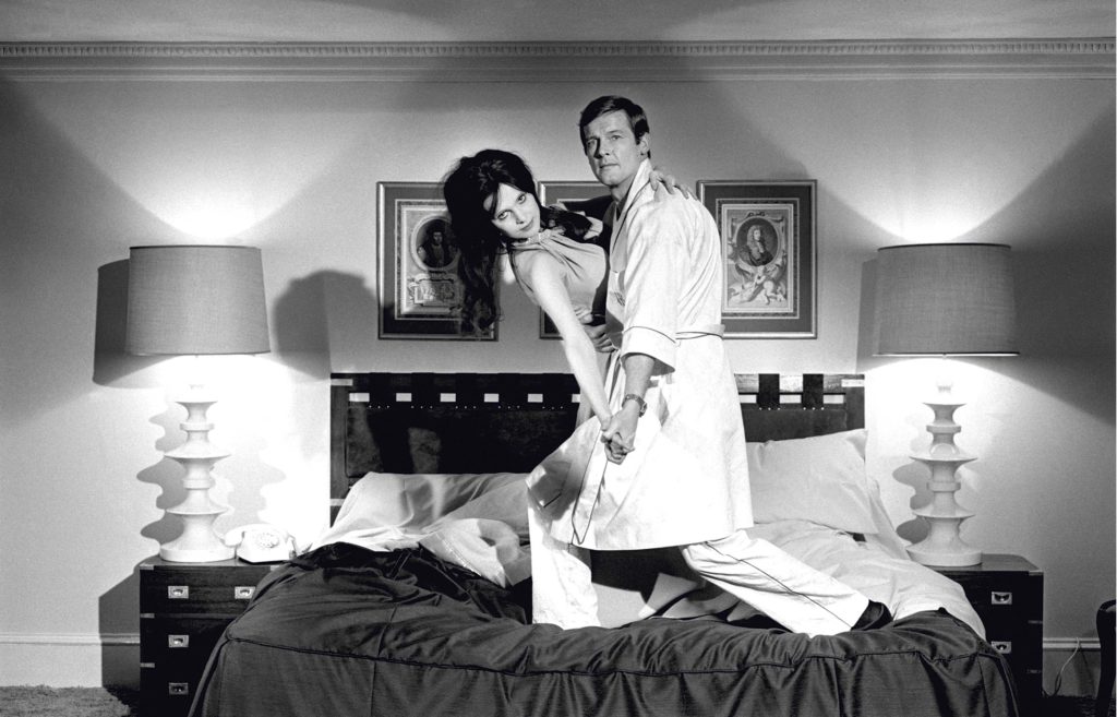 Roger Moore and Madeline Smith on Live and Let Die.